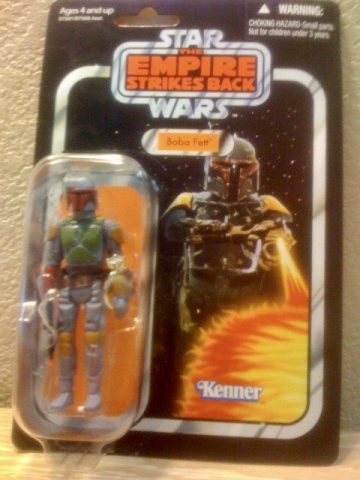 Star Wars Boba Fett action figure holding the engagement ring. Photo courtesy of M. Atchity.